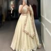 Capture Hearts in Off-White: Exquisitely Embroidered Lehenga Choli with Shimmering Sequins