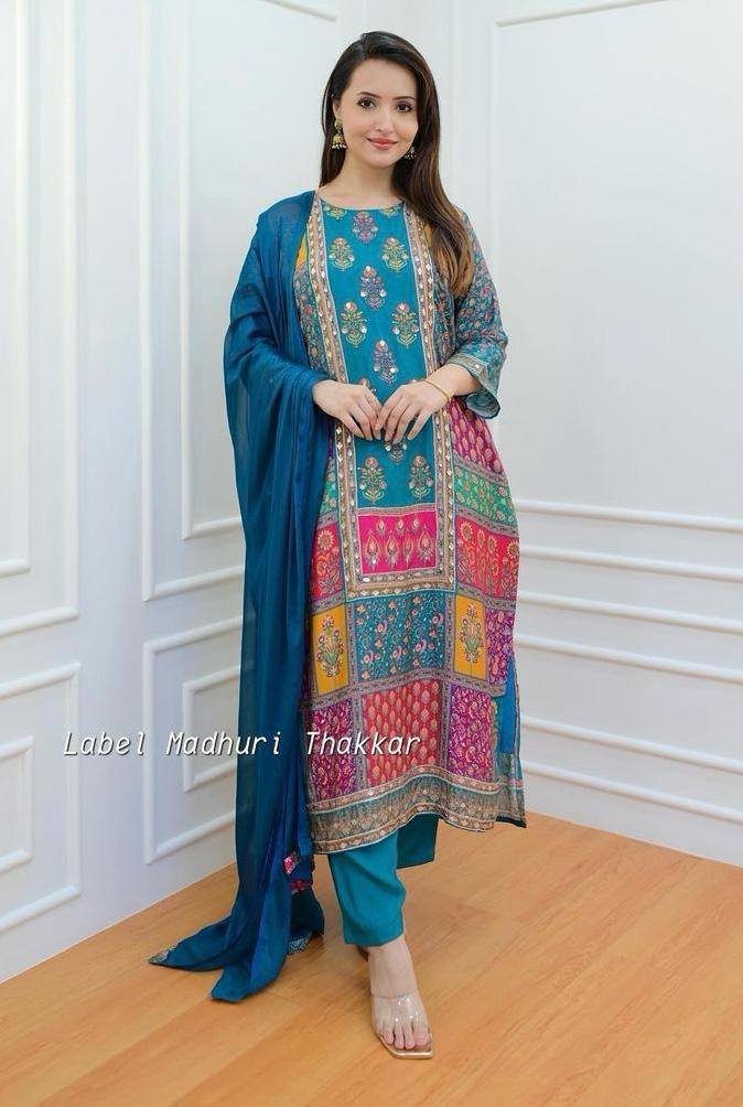 WhatsApp Image 2025-01-09 at 4.16.40 PM Kurti Pant And Dupatta- Beautiful printed Maslin kurta set with beautiful Daman and.sleeves with full Sequence Work in kurta